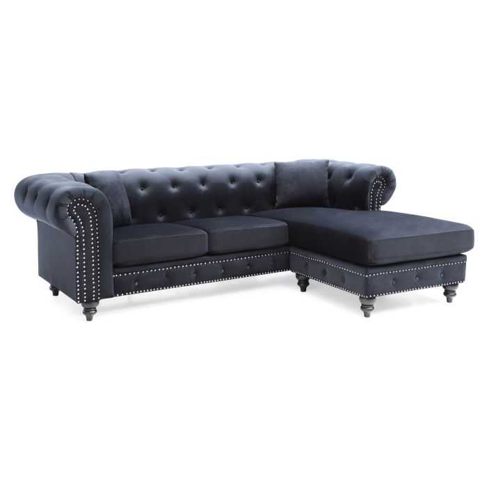 navy tufted Chesterfield sectional sofa with a right-facing chaise