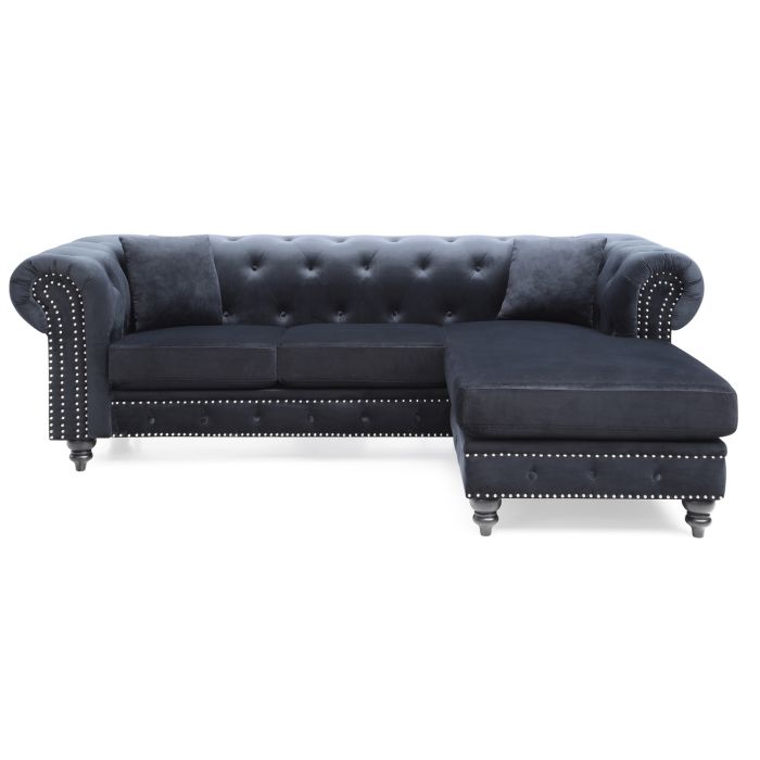 navy tufted Chesterfield sectional sofa with a right-facing chaise